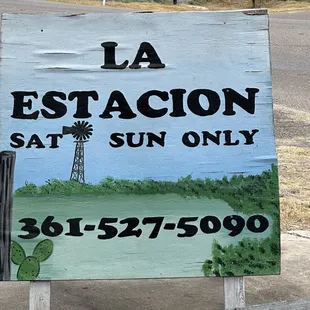 ows a sign for the restaurant