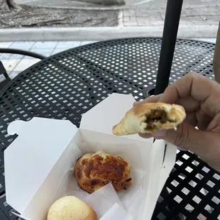 Breakfast! An empanada and a stuffed bun. Delicious!