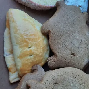 The pig is right, hug an empanada that is tasty but keep your eye on that strawberry prize.