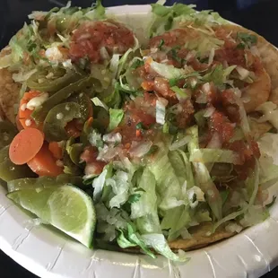 Shrimp Tacos! Three large grilled shrimp per taco, with lettuce and salsa and jalapeños on the side $8
