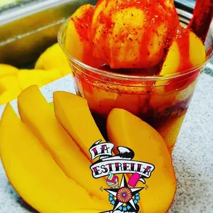 "vampirito"
Delicious Mango sorbet and mango chunks topped with chamoy and tajin