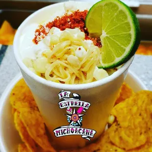 Noodle soup with corn,mayo,cheesee,lime juice and spicy chili....