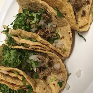 Tacos de barbacoa on El Milagro tortilla with onion and cilantro