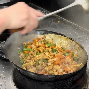 Chicken &amp; veggies stir fried.