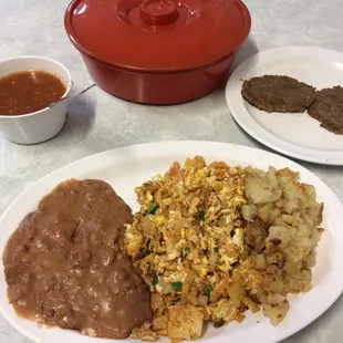 Migas a la mexicana plate with sausage added