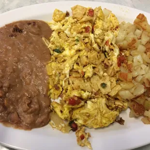 Migas a la mexicana plate with potatoes added