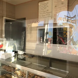 Store interior and menu at the back