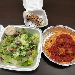 To go order. Caesar Salad, Spaghetti with 4 Meatballs and Cannoli