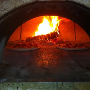 &quot;We play with fire&quot;. Real wood fired Neopolitan pizza!