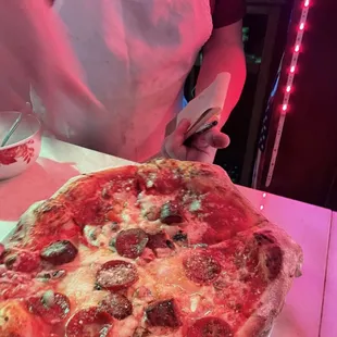 Sausage and pepperoni pizza.