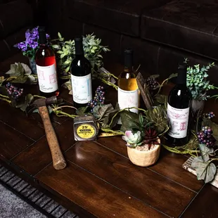 Display of 6 of La Famiglia Winery wines
Left to right (Blueprint, Open House, Journeyman&apos;s Craft, Finishing Touch, Rough-in, Punch List)