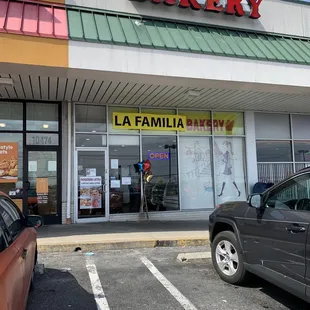 a car parked in front of the bakery