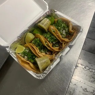 Regular steak tacos with onions and cilantro