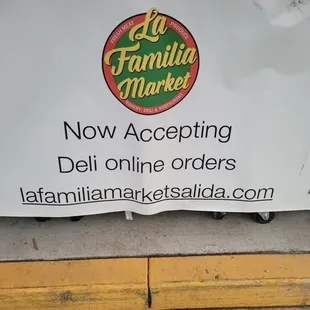 a sign for a deli