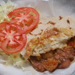 Gorditas made to order! This flavorful version is made with chicharron (pork), cheese, and beans