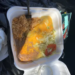a meal in a styrofoam container