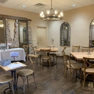 a dining room with tables and chairs