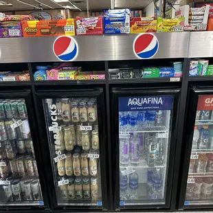 a display of drinks and sodas