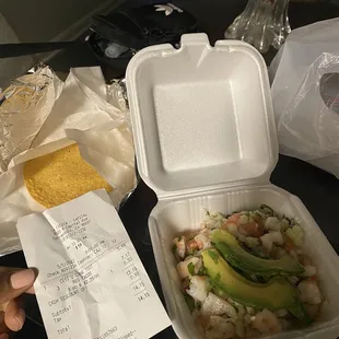 Shrimp tostada ( to go) &amp; receipt showing .50 charge for using card