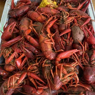 Tray of crawfish with corn and potatoes