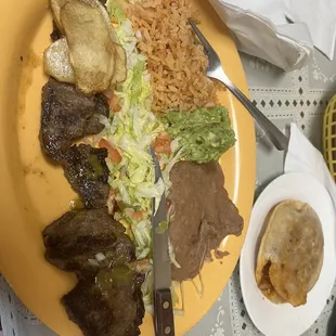 Steak plate and spicy pork gordita