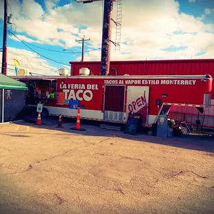 a taco truck parked in front of a building