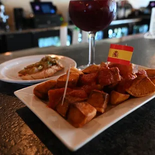 TG Patatas Bravas, sangria, eggplant (cold appetizer, no anchovy)