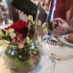 a glass of wine on a table