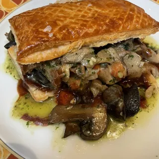 Fricassee of Snails and Mushroom Provencal Served in a Puff Pastry Shell