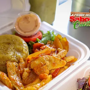 a meal in a styrofoam container