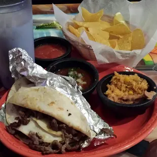 Lunch Taco CarneAsada. Tender succulent strip of beef.  Reminiscent of Al Pastor.