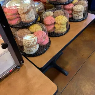 a display of cookies and pastries