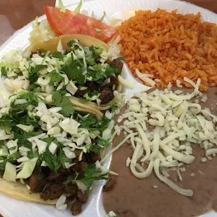 a plate of mexican food on a table