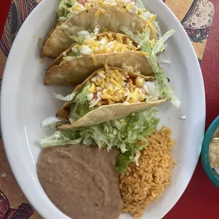 3 shredded taco's combination with rice and beans $7.50