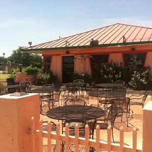 tables and chairs outside a restaurant