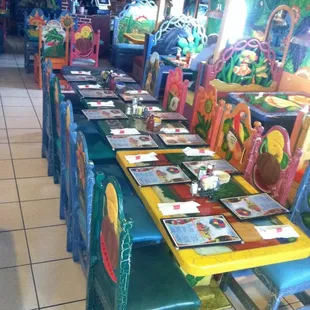 colorful tables and chairs in a restaurant