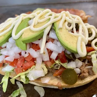 a taco with toppings