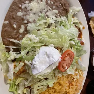 A chicken burrito under there  Beans were lame