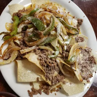 Kids nachos add pepper and onion