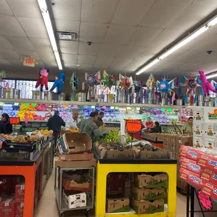 Fresh produce: lemon, avocados, lettuce, oranges, etc.