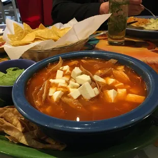 Giant bowl of chicken tortilla soup.