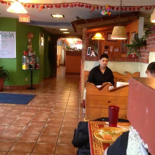 a woman sitting at a table