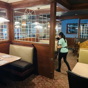 a woman walking through the door