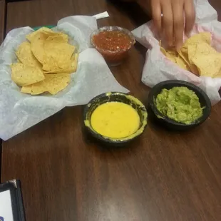 Salsa, cheese dip, avocado dip.