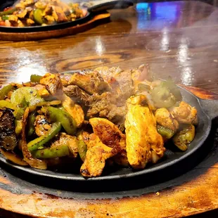 Steak and chicken combo fajitas