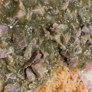 Slop tiny pieces of meat in green sauce