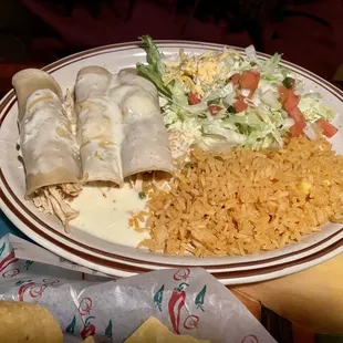 Chicken enchiladas with white queso.