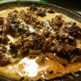 Chori-pollo  Thick queso, chorizo and chicken!