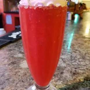 a drink with whipped cream on top