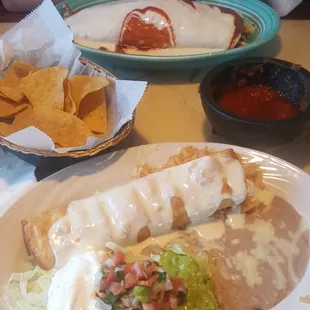 Burrito California in the back and up close is the chicken chimichnga with of course complimentary chips and salsa.